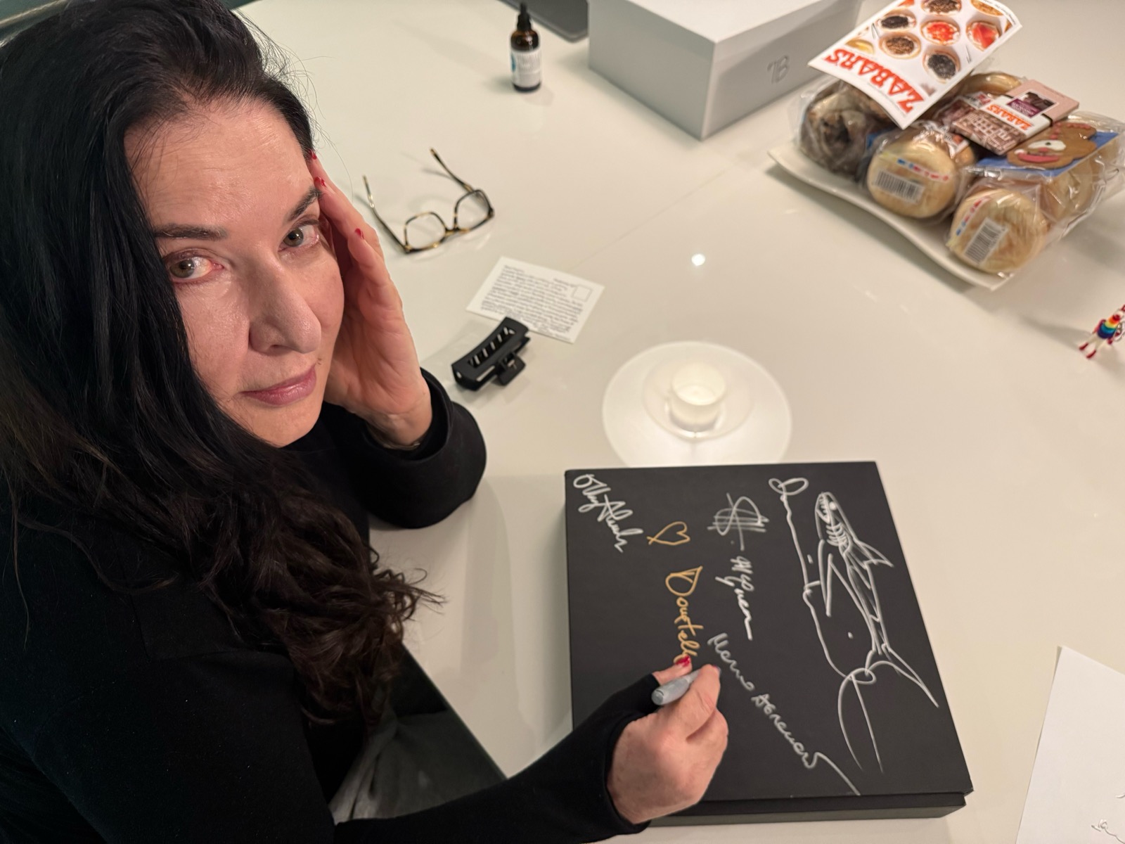 Marina Abramović signing the Misfits Pride Edition
